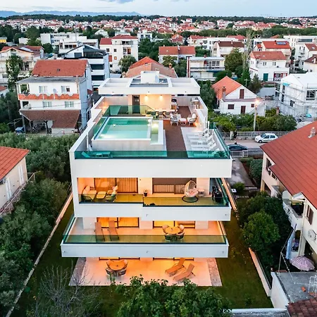 Aura Maris By Belmont Realty *