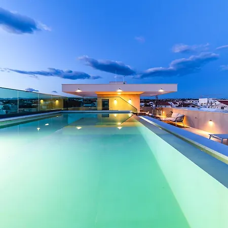 Aura Maris By Belmont Realty *