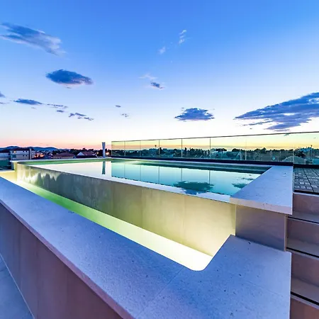 Aura Maris By Belmont Realty *